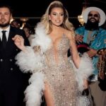 Nașele au fascinat la celebrarea căsătoriei finilor Armin Nicoară și Claudia Puican! Roxana Vașniuc a purtat o ținută impresionantă de aproape 3.000 de euro, iar Georgiana Lobonț a strălucit într-o rochie roșie, demnă de o regină 5 nasele au stralucit la nunta finilor armin nicoara si claudia puican roxana vasniuc tinuta de aproape 3 000 de euro iar georgiana lobont a fost focoasa intr o rochie rosie de regina 690367bc1edd7